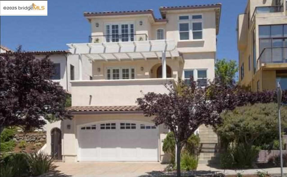 Exquisite Mediterranean with panoramic San Francisco Bay views in Upper Rockridge. The formal living room with fireplace and breakfast nook at the front of the house offers a perfect setting for dining and entertaining with stunning views. The centrally located gourmet kitchen encourages family time and features high-end finishes and chef-worthy appliances. Toward the rear, a cozy family room with fireplace opens to a lushly landscaped, level-out backyard—ideal for relaxing or entertaining. Upstairs, the primary suite showcases Bay views and includes an adjoining library with custom built-in bookcases. Located on a desirable street just above the Sunflower Path, minutes to College Avenue and Montclair Village, with easy access to BART and Highways 13, 24, and 580. Zoned for sought-after Hillcrest Elementary.