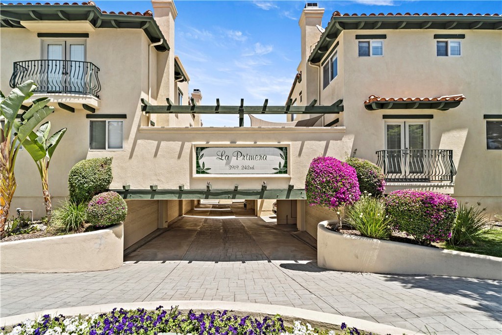 Located in a quiet community in the heart of desirable Walteria, this beautifully maintained end-unit townhome offers an ideal blend of comfort, convenience, and smart layout. The light-filled interior features an open-concept great room with maple hardwood floors, recessed lighting, a cozy gas fireplace, and seamless flow to a charming outdoor patio—perfect for relaxing or entertaining. The modern kitchen is open to the dining and living areas and features granite countertops, pendant lighting, a walk-in pantry, and plenty of storage. Downstairs also includes a convenient half bathroom for guests. Upstairs, you’ll find three spacious bedrooms. The primary suite features a walk-in closet and its own private bathroom. The two additional bedrooms share a large, sunny hallway bathroom, ideal for family or guests. One of the standout features of this home is the oversized two-car attached garage with abundant built-in storage, plus a nearby guest parking spot that also works great as a safe and flexible space for kids or pets to play. —a rare find in townhome living! Additional highlights include in-unit laundry, ceiling fans, and mirrored closet doors. Enjoy the best of this desirable beachside community with nearby parks, top-rated schools, shopping, dining, and easy access to the beach and freeways—all in a peaceful, well-kept neighborhood.