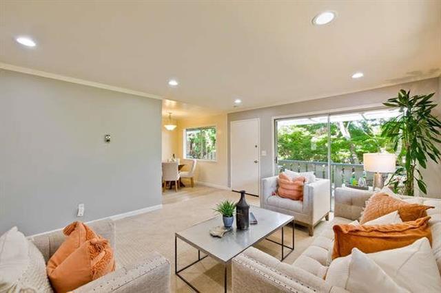 Welcome to this beautifully updated upper-level 2-bedroom, 1-bath condo nestled in a quiet, tree-lined community near vibrant Downtown Campbell and top-rated schools. This inviting home features a bright and functional floor plan with newer flooring, recessed lighting, dual-pane windows, and a sliding door that opens to your own private balcony - perfect for morning coffee or evening relaxation. The remodeled kitchen is equipped with warm wood cabinetry, granite countertops, and a modern design that makes cooking a joy. The stylish bathroom offers dual sinks and contemporary finishes for added comfort and convenience. Enjoy the benefits of a well-maintained community with HOA coverage that includes water, sewer, garbage, earthquake insurance, exterior maintenance, landscaping and common area utilities. Dedicated carport parking is included. Located just minutes from the Pruneyard, Santana Row, Valley Fair Mall, parks, and major commuter routes including Hwy 280, 880, and San Tomas Expressway, this home offers the perfect blend of comfort, convenience, and community. Don't miss this wonderful opportunity to own in one of Campbells most desirable neighborhoods! Virtual staging,