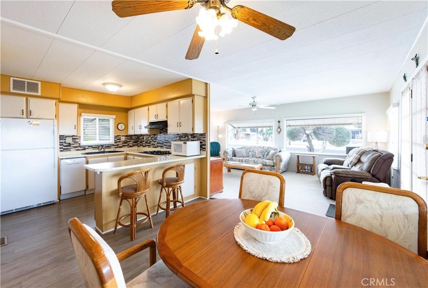 Charming 2-Bedroom Home with Mountain Views in Golf Paradise 55+ Community!

Welcome to this delightful two-bedroom, two-bathroom home. It offers an inviting open-concept layout, where the living room seamlessly flows into the dining area. The cute and functional kitchen is perfect for everyday living, while the beautiful windows showcase breathtaking mountain views and fill the space with natural light. Step outside to a lovely patio surrounded by citrus trees, creating the perfect spot to relax and enjoy the serene surroundings.
Located in Golf Paradise, a premier 55+ community, residents enjoy unlimited golf, a sparkling pool, pickleball courts, and an on-site restaurant just steps away. Conveniently close to shopping centers and easy access to the highway, this home offers both tranquility and accessibility.
Don't miss to live in a vibrant, active community.