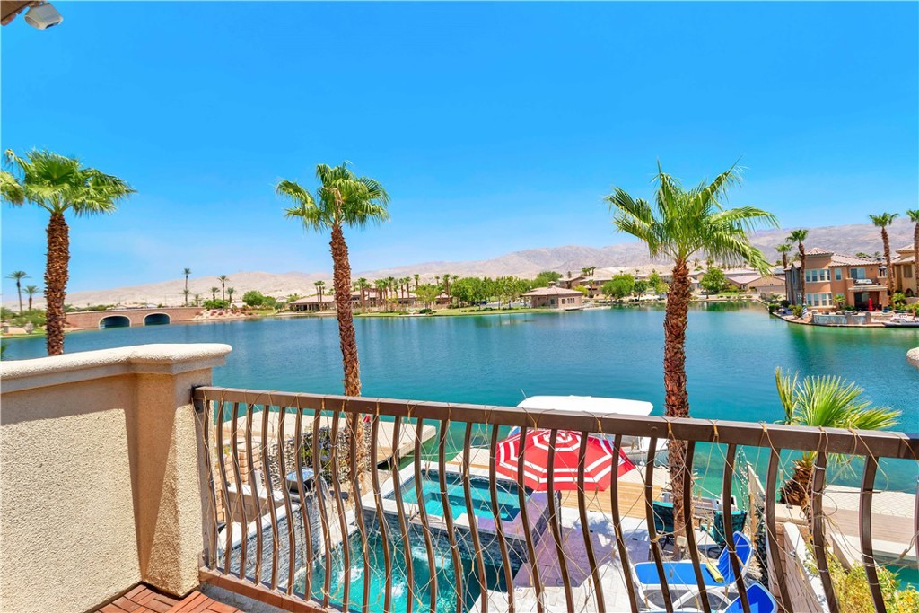 Stunning Lakefront Investment Opportunity – No Rental Restrictions!
Welcome to a truly one-of-a-kind investment opportunity located in a community renowned for its short-term rental-friendly policies and NO rental restrictions. This beautifully appointed 4-bedroom, 3-full bathroom waterfront home offers the perfect blend of luxury, comfort, and exceptional income potential—an ideal choice for investors or anyone seeking a premium lakeside retreat.
Perfectly situated in the most desirable location on the lake, this property boasts easy access to top local attractions including Fantasy Springs Resort Casino, the world-famous Coachella and Stagecoach music festivals, and the prestigious annual Indian Wells Tennis Tournament. Whether you're looking for a high-performing income property or a relaxing vacation home, this residence delivers on all fronts.
Comparable homes in the area generate over $130,000+ in annual gross rental income, and this expansive lakefront gem is poised to outperform expectations, thanks to its size, upgrades, and unbeatable location.
This property is One of the largest homes on the lake with 4 spacious bedrooms and 3 full bathrooms
Open-concept living area featuring luxury finishes, a stylish fireplace, and a built-in bar with wine fridge
Chef’s kitchen with high-end appliances, modern countertops, walk-in pantry, and ample cabinetry
Designer-furnished interiors with modern, airy décor curated for guest comfort and style
Step in outside to Resort-style backyard with:
Sparkling pool with water and fire features, Oversized 12-person Jacuzzi (one of the largest in the area) Professional outdoor BBQ station Natural granite pavers and lush palm landscaping, Breathtaking views of the lake and picturesque bridge Property also comes with a Private boat dock and to sweeten the deal included in the sale Electric boat and a trailer.
This turnkey property comes fully furnished and Airbnb-ready—set up for immediate passive income with no additional effort required.
Don’t miss your chance to own a rare lakefront property that combines high-end living with outstanding earning potential. Whether you're an investor or someone looking to enjoy Lakefront luxury living, this home is ready to deliver.