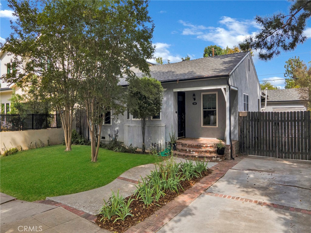 Welcome to 5450 Buffalo Avenue, a timeless single story residence tucked away in the heart of Sherman Oaks. This beautifully maintained 3 bed, 2 bath home offers approximately 1,735 sq. ft. of living space on a generous almost 7,300 sq. ft. lot, blending classic mid century character with today’s modern comforts. Step inside to an inviting living room centered around a cozy fireplace, perfect for gatherings or quiet evenings at home. The open layout flows seamlessly into a bright dining area and well appointed kitchen, creating an effortless space for both entertaining and everyday living.
Each bedroom is spacious and thoughtfully designed, including a serene primary suite with ample closet space and a private bath. Natural light fills the home, highlighting the warmth of its original charm. Outside, the expansive backyard provides endless possibilities from peaceful relaxation to lively entertaining. Situated in a sought after Sherman Oaks neighborhood, this home offers easy access to top schools, local parks, shopping, dining, and convenient commuter routes.