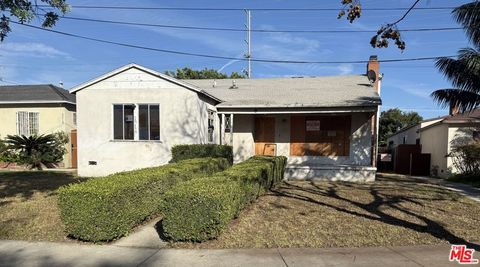 Photo of 3520 Carmona Avenue, Los Angeles, CA 90016 (MLS # 26659709)