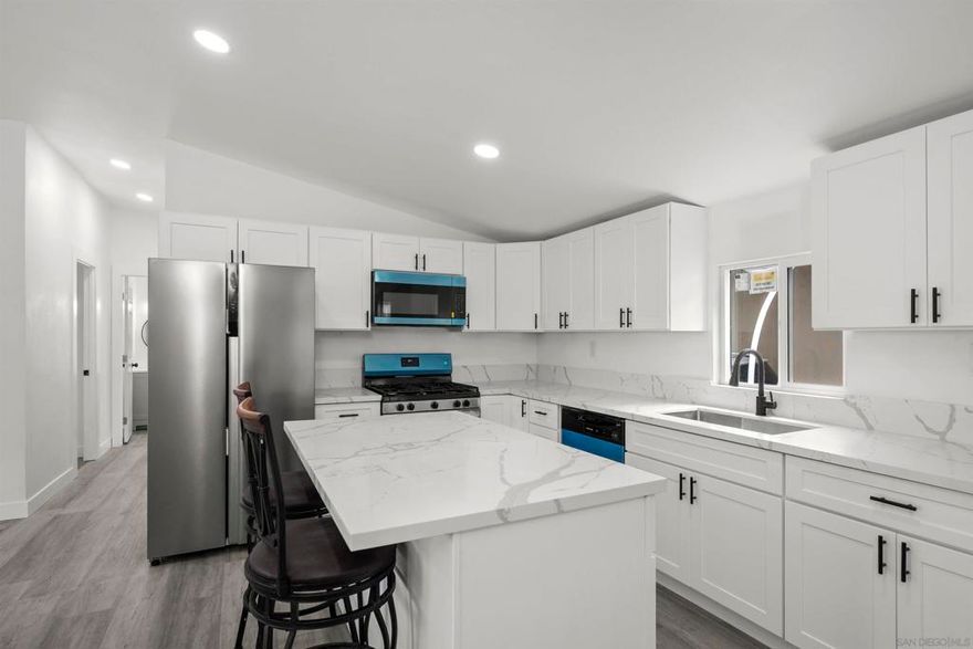 Welcome to a Completely Remodeled home in the desirable ALL AGE community of Lamplighter Village. Home Features 3 bedrooms, 2 Full bathrooms built in 1999, 1540 sqft with vaulted ceiling throughout the home and spacious open concept living room. Home has been Completely remodeled with no expense spared! New Drywall texture throughout, New double pane windows, New Pex Plumbing, New Walk-in tile shower in one bathroom and New tub with tile surround in other bathroom, New plumbing fixtures, New vanities and toilets, New kitchen cabinets and island with quartz countertop and Stainless steel appliances, New LVP flooring and baseboard, New closet doors, New ceiling lights and electric outlets, New exterior handrails, freshly painted interior and exterior, New exterior carpet, and large laundry room, walk-in closet in master bedroom and second bedroom. Community features a pool, hot tub, and club house. NO PROPERTY TAX. This home is centrally located near parks, shopping centers, restaurants, and freeways!