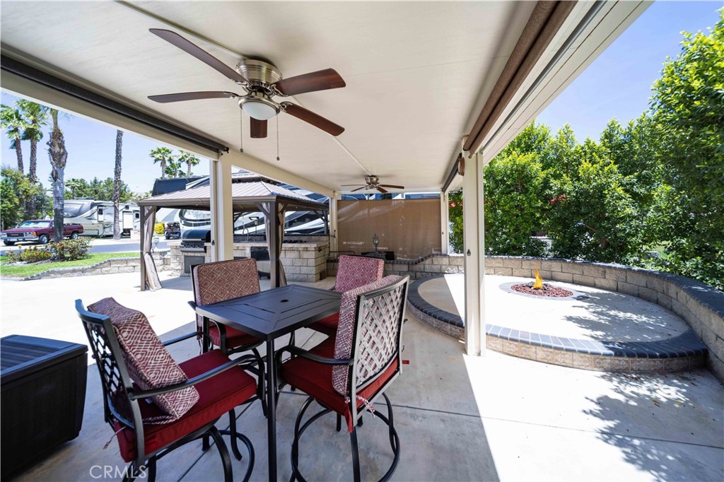 This Property is Set Up for your Entertaining, It has a Built-In BBQ, Dishwasher with Island Covered by Allumawood Cover, Great Sitting Wall and FirePit for those Late Night Sit Abouts. Close to the Entrance with the Restaurant and Market as well as the Small Club House and Pool.... Included in Rancho California RV Resort is a 14 hole Executive Golf Course that is free for owners, 5 Pools and Jacuzzi areas, Tennis Courts, Pickle Ball Courts, Laundry Rooms, Dog Park, Horse Shoe Lawn, Club House, Hiking Trails, all inside Gated Community that is Guarded 24/7. You can live here or rent your space. Peace and quiet serenity all just 25 minutes from Temecula Wine Country. No age restrictions. Come on over and check this hidden gem of a place out..
Financing Available.....