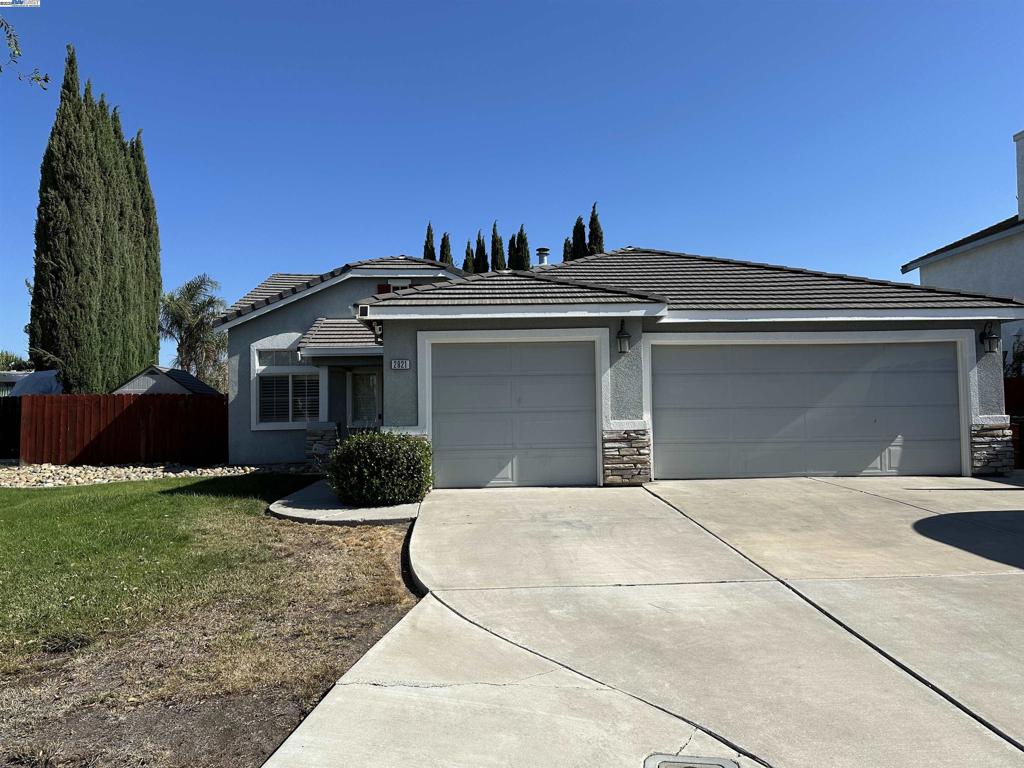Rare Single-Story Gem with 3-Car Garage & Pebble-Tec Pool! Don't miss this rarely available, beautifully maintained single-story home featuring a spacious 3-car garage and a sparkling Pebble-Tec pool. Step inside to find elegant hardwood floors in the hallways and family room, with low-maintenance laminate flooring in all bedrooms and tile in the kitchen. This home is packed with upgrades, including a whole house fan, water softener, and reverse osmosis system. The hall bathroom has been tastefully remodeled, and the water heater is newer for added peace of mind. The fencing was replaced approximately 8 years ago. Enjoy outdoor living in the fabulous backyard—complete with a large covered patio, hot tub, pool, and multiple storage buildings. Whether you're entertaining or relaxing, this yard has it all. Move-in ready and waiting for you!