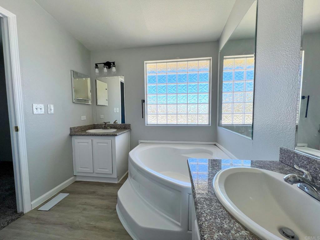 Spacious and energy-efficient 4-bedroom, 2-bathroom home just minutes from the Marine Corps Air Ground Combat Center and Joshua Tree National Park. This well-maintained property features a flexible layout with both a formal living room and a separate family room—ideal for entertaining, remote work, or multi-generational living. The open kitchen flows into the main living areas, and the private primary suite offers a large soaking tub, dual sinks, and generous closet space. Appliances are included, making this a truly move-in ready home. This property includes a certified septic system, tuned-up cooling systems, and a solar energy system to help reduce monthly utility bills. The large, usable lot provides plenty of space for RV parking, outdoor toys, or future development such as an ADU or workshop. With clear desert skies, mountain views, and proximity to schools, shopping, and outdoor adventure, this home is perfect for homeowners or investors looking for long-term value in a high-demand rental market. Don’t miss this excellent opportunity in one of the High Desert’s fastest growing communities.