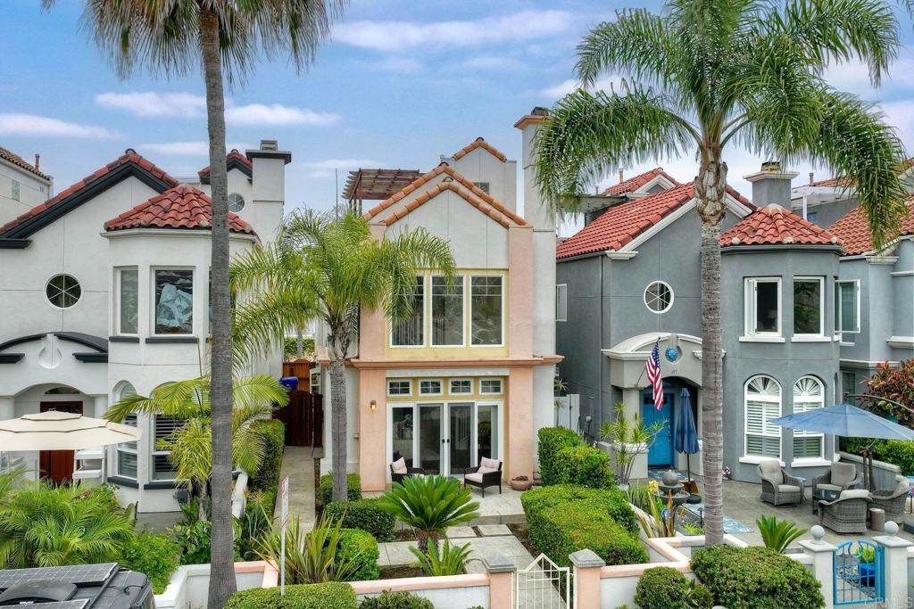 Experience refined coastal living in this elegant, light and airy residence, just steps from sandy shores, swaying palm trees, and an easy walk to the West Coast’s longest wooden pier. With windows everywhere, the home is bathed in natural light, featuring a side-entry front door, a spacious formal living room, and an open-concept layout with an elegant, large dining area—perfect for entertaining or relaxing. The well-planned kitchen offers both style and functionality, ideal for preparing meals with ease. Step outside to your private front patio to enjoy ocean breezes, morning coffee, or evening sunsets. Located in a newer, well-maintained neighborhood of beach homes, this property combines luxury, comfort, and a serene coastal lifestyle.