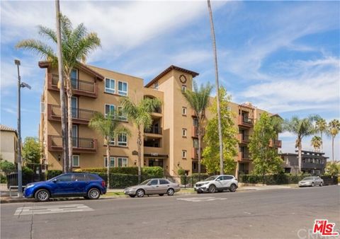 Photo of 1401 S St. Andrews Place #103, Los Angeles, CA 90019 (MLS # 26673375)