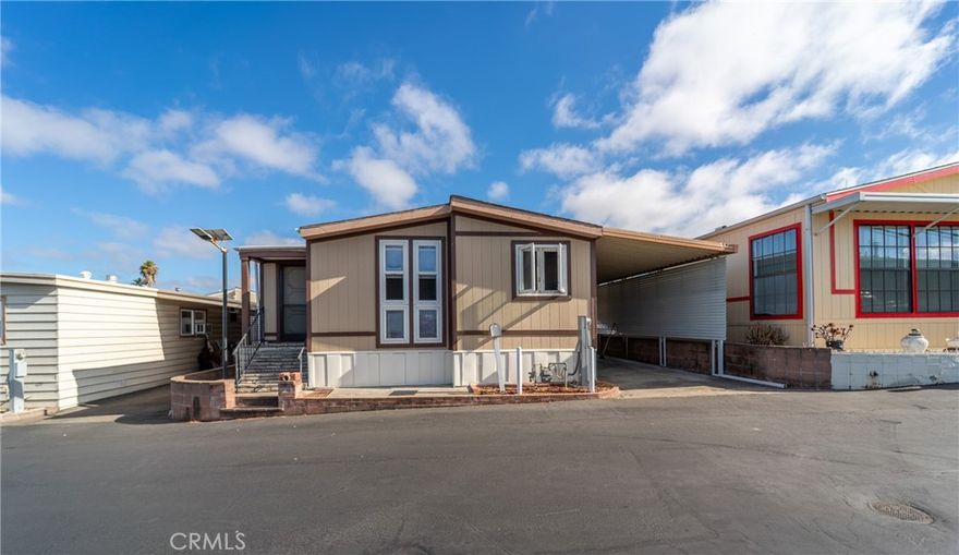 *WELCOME HOME to the highly sought after SAN LUIS REY 55+ COMMUNITY located just minutes to Oceanside Beach, Pier & Harbor which offers anything and everything you could ever want to do with plenty of amazing restauraunts and a plethora of activities on and off the water. Own your land that is just down the steet from the beautiful Historic Mission San Luis Rey. This 1280 sq ft 1982 Golden West doublewide manufactured home offers 2 bedrooms, 2 baths with an open concept floorplan. The master bedroom is oversized & the updated kitchen has everything you need and opens up to the dining and living room areas. The living room has a bonus alcove area with great vertical windows that can be used for added seating or maybe an office? Or reading nook?  The master bedroom retreat is oversized with a huge walk in closet and a bathroom on suite. With dual vanity sinks. Cleaning is a breeze as there is updated laminate wood flooring throughout the entire home. Pass through the laundry room with tons of cupboards for storage to the covered driveway/patio that has plenty of space, storage & privacy and includes a shed & a brand new privacy barrier so you dont see your neighbor. There is ALL NEW WOOD SIDING and TRIM installed around the entire exterior that has been painted and sealed. 

HOA IS $175 MONTHLY AND THERE IS NO RENT SPACE AS YOU OWN THE LAND. The HOA includes water, trash, and sewer. NO PETS. Make new friends here as the San Luis Rey homes community comes with 2 Clubhouses with weekly social activities including Bingo! There is a library and billiard room and lots of games and puzzles to choose from. There's also a fitness room and hobby room and theres even an area to wash your car! Need MORE storage? There is currently a waiting list for the RV storage lot and personal storage sheds that when available are extremely affordable., I mean dirt cheap. This community has SO much to offer. It is one of the only affordable AND nice places left to live in this area. LOW taxes and LOW HOA fees with NO space rent so close to the ocean make this property extremely desirable. Come see this move in ready well maintained home before its gone!