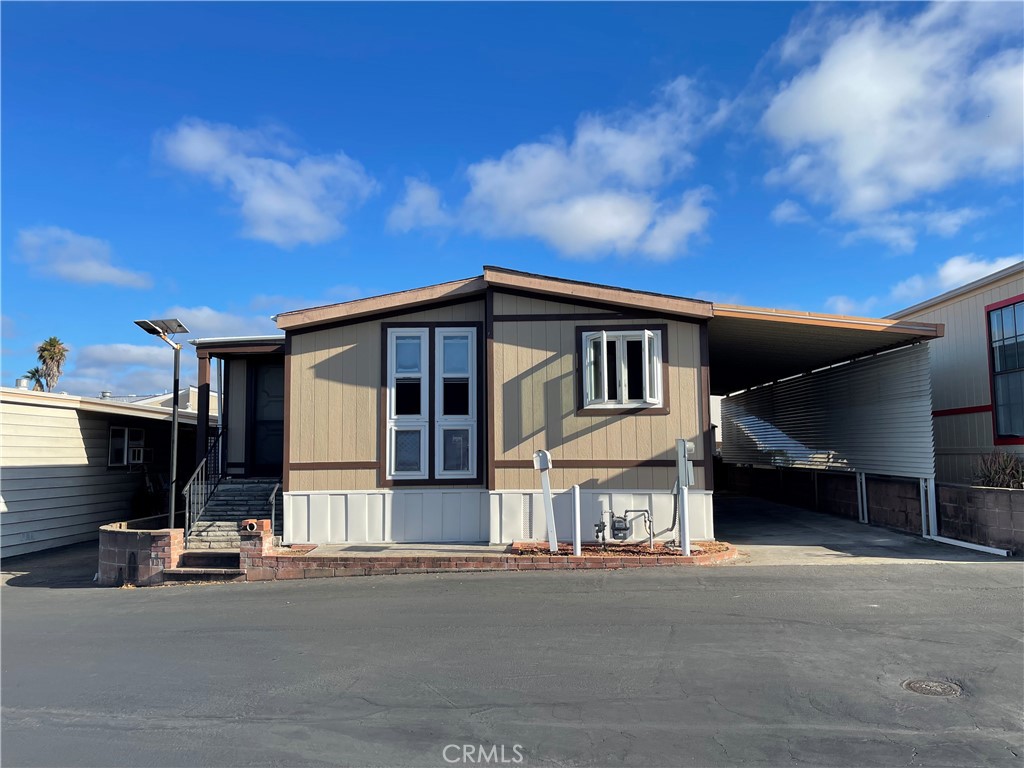 *WELCOME HOME to the highly sought after SAN LUIS REY 55+ COMMUNITY located just minutes to Oceanside Beach, Harbor & Pier and all of shopping needs. This 1280 sq ft 1982 Golden West doublewide manufactured home offers 2 bedrooms, 2 baths with an open concept floorplan. The updated kitchen has everything you need and opens up to the dining and living room areas. The living room has a bonus alcove area with great vertical windows that can be used for added seating or maybe an office? The master bedroom retreat is oversized with a huge walk in closet and a bathroom on suite. Cleaning is a breeze as there is updated laminate wood flooring throughout the entire home. Pass through the laundry room with tons of cupboards for storage to the covered driveway/patio that has plenty of space, storage & privacy and includes a shed & a brand new privacy barrier so you dont see your neighbor. There is ALL NEW WOOD SIDING and TRIM installed around the entire exterior that has been painted and sealed.
HOA IS $175 MONTHLY AND THERE IS NO RENT SPACE AS YOU OWN THE LAND. The HOA includes water, trash, and sewer. NO PETS. Make new friends here as the San Luis Rey homes community comes with 2 Clubhouses with weekly social activities including Bingo! There is a library and billiard room and lots of games and puzzles to choose from. There's also a fitness room and hobby room and theres even an area to wash your car! Need MORE storage? There is currently a waiting list for the RV storage lot and personal storage sheds that when available are extremely affordable., I mean dirt cheap. This community has SO much to offer. It is one of the only affordable AND nice places left to live in this area. LOW taxes and LOW HOA fees with NO space rent so close to the ocean make this property extremely desirable. Come see this move in ready well maintained home before its gone!