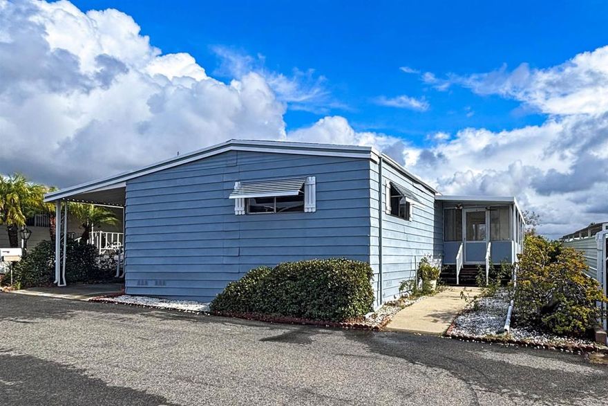Welcome to 243 Havenview Lane, located in the desirable Rancho Calavera 55+ mobile home community in Oceanside. This spacious 2-bedroom, 2-bathroom home offers 1,464 square feet of comfortable living area with an open, airy feel throughout.  Enjoy beautiful mountain views from the living room, providing a peaceful backdrop for everyday living. The updated kitchen features a new stove/oven and dishwasher, along with refreshed countertops, lighting, paint, and wallpaper, creating a bright and inviting space for cooking and entertaining. The guest bedroom offers an exceptionally large walk-in closet for extra storage.  The generous floor plan offers plenty of room for guests, hobbies, or a home office. Best of all, the lot rent is exceptionally affordable at just $765, making this home an outstanding value in North County.  Ideally located, the community is freeway close and just blocks from Costco and other shopping, dining, and conveniences, offering easy access to everything Oceanside has to offer.