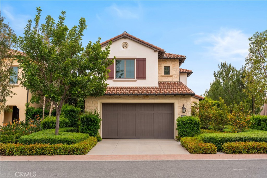 Stunning former Irvine Pacific model home in the guard-gated Reserve at Orchard Hills, featuring over $200,000 in premium upgrades. South-facing backyard with serene park view. Thoughtfully designed floor plan with 4 bedrooms and 3 bathrooms, including a downstairs bedroom and full bath. Gourmet kitchen with quartz countertops, full backsplash, built-in refrigerator, pot and pan drawers, and soft-close cabinets. Engineered wood flooring, upgraded carpet, custom window shutters, and recessed lighting. Master suite offers a privacy door, frameless shower, and upgraded tile to ceiling. Additional features include crown molding, chandeliers, two-tone paint, solid core interior doors, open shelving, floating mirrors, and pre-wired alarm system. Energy-efficient upgrades include whole house fan, tankless water heater, and hot water circulation system. Walking distance to park, clubhouse, and pool. Biking distance to Northwood High. Move-in ready!