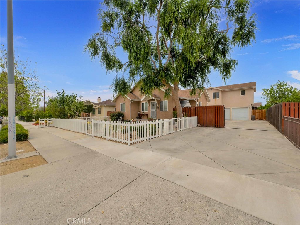 Discover the perfect blend of modern living and smart investment at 10720-22 Saticoy Street, located in the desirable heart of Sun Valley. This pride-of-ownership property features two separate structures on one lot, offering a sought-after unit mix of 1 (3 bed, 2 bath) and 1 (3 bed, 3 bath). Ideal for investors or owner-occupants, the setup allows for flexible living arrangements, rental income, or multi-generational housing.
The primary residence has been fully remodeled in 2016, showcasing updated finishes, enhanced comfort, and a refreshed layout that’s move-in ready. The second unit, newly built in 2016, is not subject to rent control, offering favorable options for long-term leasing or short-term rental strategies. Both units are individually metered for gas and electric, and the property includes on-site parking for added convenience and tenant appeal.
Centrally located, this property offers outstanding accessibility with close proximity to the I-5 and CA-170 Freeways, and just minutes from Hollywood Burbank Airport, Bob Hope Airport Train Station, and Burbank Airport North Station. For everyday convenience, residents will enjoy easy access to Costco Business Center, Home Depot, and a variety of shopping and transit options. Students and faculty alike will appreciate the nearby Woodbury University, adding to the property’s long-term rental demand.
Whether you're looking to invest in a turnkey duplex or secure a stylish home with built-in income potential, 10720-22 Saticoy Street stands out as a rare and rewarding opportunity in one of Sun Valley’s most convenient locations.
This information has been secured from sources we believe to be reliable, but we make no representations or warranties, expressed or implied as to the accuracy of the information. References to square footage or age are approximate. Buyer must verify the information and bears all risk for any inaccuracies.