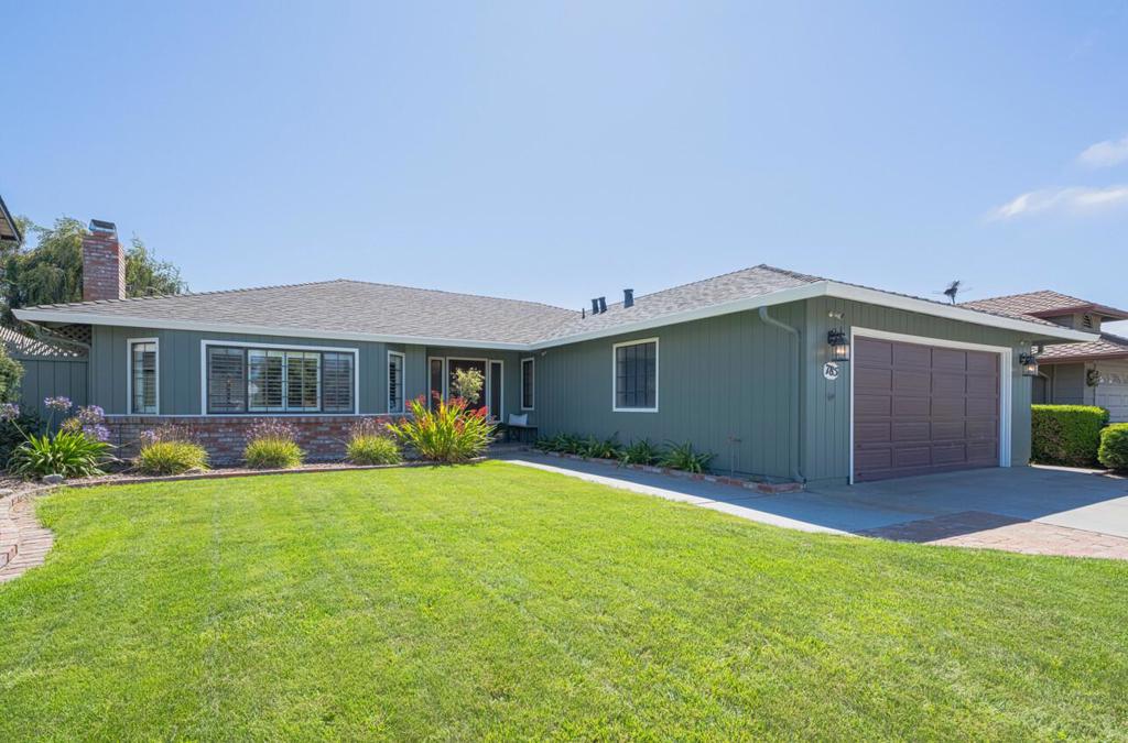 Welcome to this charming Harrod built home situated on a beautifully landscaped lot, located in the coveted Montecito neighborhood of South Salinas. Offering a well-planned living area of 1,702 sq. ft. this inviting residence provides ample space for relaxation and entertaining. The home features hardwood oak floors throughout the entry, living area, kitchen & hallway and boasts a newer roof. The spacious kitchen is equipped with a gas oven range, dishwasher, & garbage disposal, complemented by expansive tile countertops, breakfast bar & a pantry for added storage. Centrally located, the kitchen affords access to both the formal dining room and the separate, cozy family room. Enjoy peaceful evenings in the elegantly appointed living room area that features a romantic brick fireplace and bay window. The bedrooms are generously sized with large closets and both bathrooms have been thoughtfully updated. The indoor laundry room has a large utility closet, and the washer & dryer are included. Storage space abounds in this well-built home; even the 2 car garage has built-in floor to ceiling cabinets. The back yard is private & sheltered, perfect for afternoon bbq's & bird watching. And all of this is just minutes away from hospitals, shops, parks & schools and Highways 68 & 101.