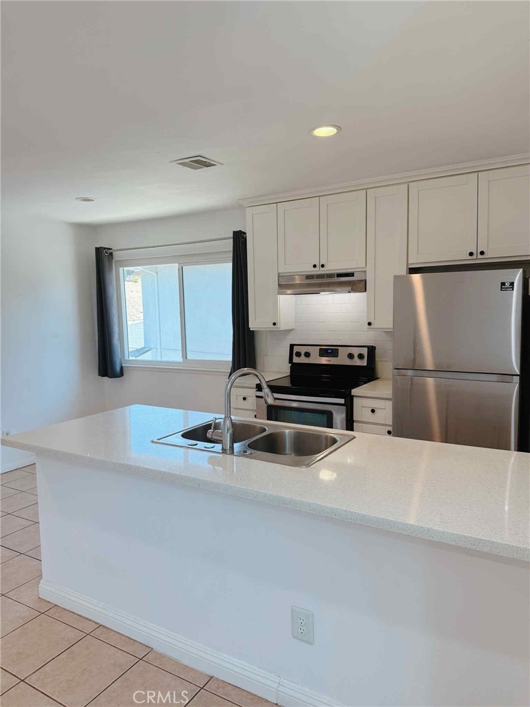 Most Convenient location in City of Rowland Heights. Walking distance to YES plaza, all kind of foods, restaurants, stores, banks, market. Less than 5 mins drive to Costco. Easy access to highway 60 and 57. This 2 beds 1 bath condo is a single level located on the 2nd floor. Tandem parking space: One carport parking space and can park another car behind the carport space. Storages space on the mainfloor. No sharing laundry with others. Community Swimming pool. Water and Trash included in the rent.