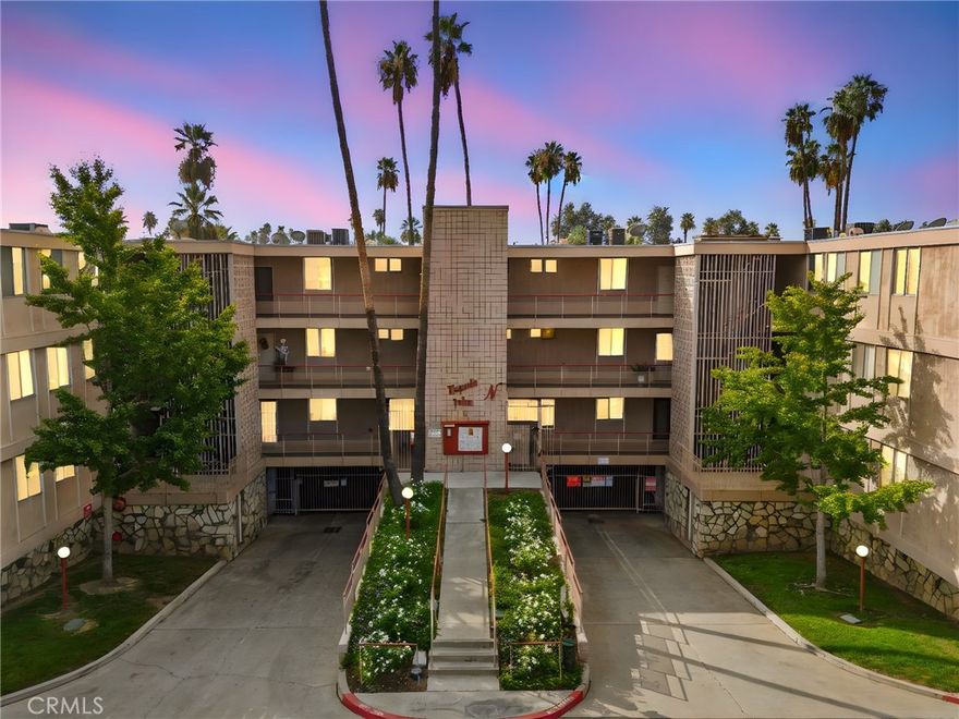 Welcome to 6979 Palm Ct #104-A, Riverside, a beautifully renovated 1,234 sq. ft. condo in the highly sought-after Magnolia Palms community. This move-in ready home offers 3 bedrooms, 2 bathrooms, and a thoughtfully designed open-concept layout perfect for comfortable everyday living and entertaining. The spacious great room flows seamlessly into the updated kitchen, featuring modern appliances, ample counter space, and a layout that makes cooking and hosting effortless. Brand-new luxury vinyl plank flooring, crown molding, and ceiling fans enhance the home’s contemporary style, while indoor stackable laundry adds convenience. The master suite includes a private ensuite bath, and the two additional bedrooms share a generously sized second bathroom. Multiple sliding glass doors provide easy access to the covered rear patio, ideal for morning coffee or evening relaxation. Additional highlights include a gated underground parking garage with one dedicated space and a storage cabinet for extra convenience. Residents enjoy resort-style amenities, including a sparkling pool and spa, lush landscaping, and serene picnic and relaxation areas. Perfectly located, this condo is walking distance to shopping centers, schools, and the University of California Riverside (UCR), with easy access to the 91 freeway for commuters. Whether you’re a first-time homebuyer, investor, retiree, or student, this property combines style, functionality, and location. Don’t miss this rare opportunity to own a turnkey condo in Riverside’s Magnolia Palms community - at a great price. Schedule your private tour today and experience the perfect blend of comfort, convenience, and modern upgrades.