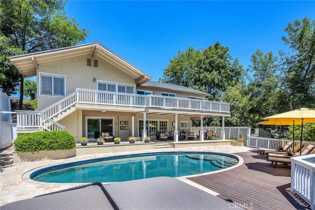 Expansive Flat Usable Lot with Guest House & Pool on the Palos Verdes Peninsula! Escape the city and immerse yourself in a serene, spacious paradise surrounded by nature. This lot has an unlimited amount of space for gardens, a pickle-ball court, a basketball court, animals, and anything you can imagine! Very impressive and hard to find 28,000 square feet of usable land!!
A private retreat on the Palos Verdes Peninsula—this 5-bedroom, 3.5-bath estate spanning 4,049 square feet of refined living space is perfectly situated on a sprawling 28,907 square foot lot. The detached Guest house is a lovely 900 square foot 1 bedroom and 1 bath unit with a sunny deck. This exceptional property offers the ideal blend of luxury, comfort, and equestrian charm.
The main residence boasts a thoughtfully designed floor plan with spacious living and entertaining areas, including a formal living room, a large family room with a fireplace, and a comfortable dining area. With views of the lush yard, the kitchen seamlessly connects to the expansive deck, creating an ideal setting for indoor-outdoor living and effortless entertaining. New countertops and backsplash, eat-in counter space, and custom cabinetry. Generous bedrooms provide peaceful retreats, while the primary suite offers a luxurious en-suite bath and an insane walk-in closet.
Step outside to your resort-style oasis—complete with a sun-drenched pool and spa surrounded by a large deck, perfect for lounging, entertaining, or enjoying warm California evenings. The expansive backyard is ideal for gatherings or quiet relaxation, all framed by mature landscaping and open skies.
Adding to the appeal is a charming one-bedroom guest house, complete with an open kitchen/living room, full bath, and interior laundry—ideal for extended family, guests, or potential rental income.
With nearly 2/3 of an acre, the property provides ample outdoor space for equestrian use and is zoned for horses. Easy access to the trail from the street. Whether you're envisioning stables, a corral, or just enjoying the wide-open space, the possibilities are endless. Westfield residents also enjoy access to tennis courts, riding rings, and miles of hiking and riding trails.
Tucked away in a peaceful, picturesque setting yet conveniently close to top-rated schools, scenic trails, and the coast, this is a rare opportunity to own a slice of California paradise.