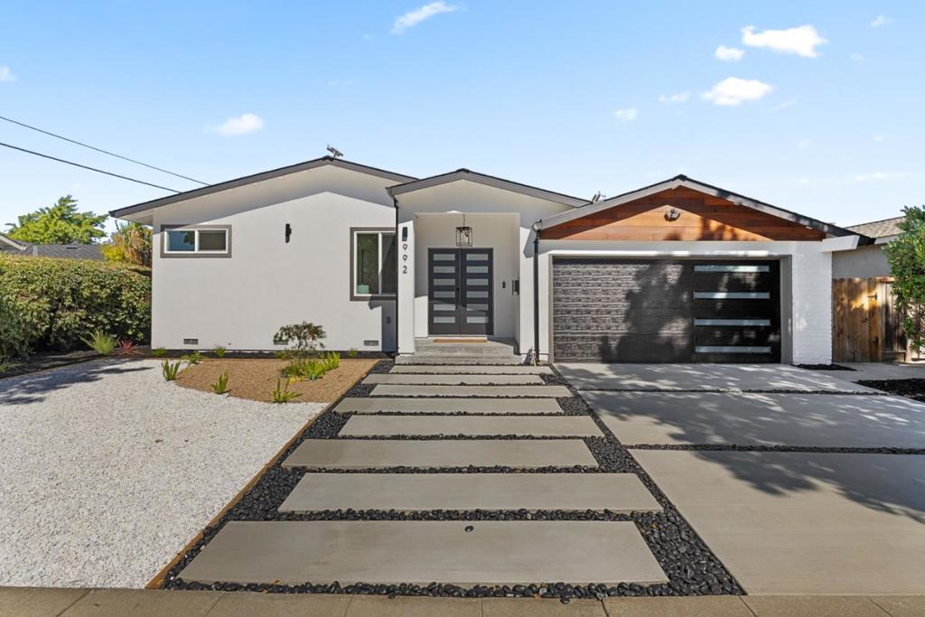 Welcome to this beautifully expanded and freshly remodeled 4 bedroom, 3 bathroom single-story home with 1,702 sq ft of stylish living space. An open living and dining area with a cozy fireplace flows into the chefs kitchen with quartz countertops, luxury modern cabinetry, and premium stainless steel appliances. The primary suite offers a spa-inspired bath, while three additional bedrooms and two more full baths provide comfort and flexibility. Two spacious living rooms create versatile areas for entertaining or relaxing. Outside, enjoy a private backyard retreat with low-maintenance landscaping and sleek hardscaping, perfect for gatherings under the stars. Additional features include updated flooring and paint, energy-efficient central HVAC, designer lighting, and an attached two car garage. Ideally located in Ponderosa Park near top schools, shopping, dining, and parks, this move-in ready home is the perfect blend of comfort, style, and convenience.