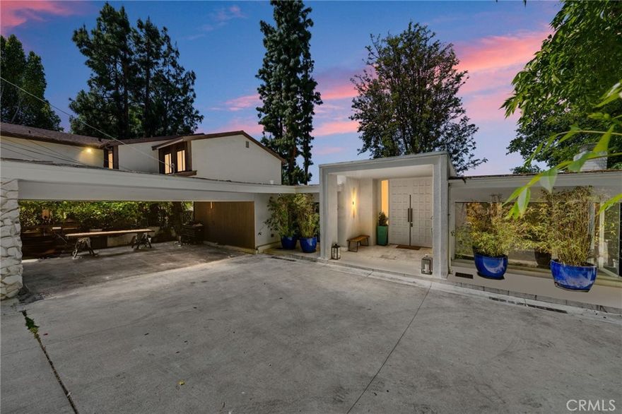Nestled in a peaceful neighborhood just south of Ventura Blvd and near Topanga Canyon, this fully furnished home offers the perfect blend of modern luxury and serene canyon living. A grand entrance opens to 17-foot bifold doors showcasing stunning 180-degree views and bathing the space in natural light. The upstairs features heated hardwood floors, recessed lighting, and a newly renovated kitchen and bathrooms—including a spa-like master with a massive walk-in rain shower.



Ideal for entertaining and wellness, the lower level includes a custom bar and pool table lounge, a private gym, and a hidden office with a whiteboard wall and Murphy bookcase closet. Sonos speakers are wired throughout the home, including outdoors, where you'll find a retreat-like backyard with a sauna, cold plunge, outdoor shower, and living green wall. The newly built outdoor living room includes West Elm furnishings, a 55” outdoor TV, and a pergola-lit hangout area.



Enjoy ultimate privacy and convenience with an electric gate, Nest security, and weekly landscaping included. Located minutes from grocery stores, parks, hiking trails, and the 101 freeway, this home offers easy access to the Pacific Coast Highway and all the best of Southern California.