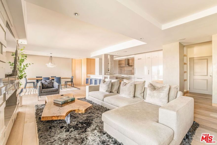 Live the West Hollywood dream at 1155 N. La Cienega Blvd #502!   This bright and beautifully updated 2-bedroom, 3-bath condo is all about style, space, elegance and comfort. Perched on the 5th floor of a full-service building, this unit offers a rare blend of modern comfort and laid-back luxury  with gorgeous city views to match.Inside, you'll find an open-concept living space perfect for entertaining or just kicking back. The updated kitchen flows effortlessly into the dining and living areas, all drenched in natural light. Slide open the glass doors to your private balcony and enjoy your morning coffee or evening wine with panoramic views of the city skyline.Both bedrooms are generously sized with en-suite bathrooms, and there's a third bathroom for guests  perfect for hosting. Thoughtful updates throughout the unit give it a fresh, modern feel while keeping the energy fun and relaxed.Located in one of West Hollywood's most iconic buildings, you'll have access to top-notch amenities including a pool, fitness center, sauna, 24-hour security, and valet parking. Just blocks from the Sunset Strip, you're close to legendary restaurants like Madeo, Sushi Park and Barney's Beanery, nightlife, boutiques, and everything that makes West Hollywood one of L.A.'s most desirable neighborhoods. Unit 502 is more than just a condo  it's a vibe. Come see it for yourself!
