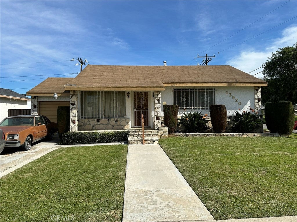 Photo of 12920 Keene AVE, Los Angeles, CA 90059 (MLS # OC26154959)