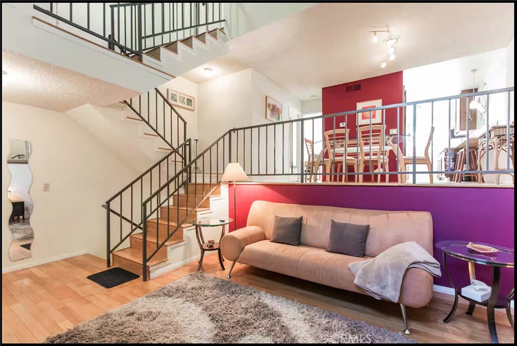 Attention Homebuyer & Passive Income Investors! Here's an Fully Furnished & ARBNB Ready 2Bd 2Ba Tri-Level Townhome with High Ceilings, Private 2-Car Garage & a Front Patio. The Unit Has Been Recently Refreshed with a New Paint & Has Some Upgrades Including Laminate & Tile Flooring, Newer Laundry Appliances, Tankless Water Heater and New Garage Door Opener. You'll Enjoy Spending Time In Front Of A Beautiful Fireplace in The Living Room. The Unit Offers Central A/C & Heating System with a Smart Nest Controller. The Spacious Kitchen with Dual Sink, Stainless Steel Appliances & Granite Countertops is Ready For a Gourmet Chief & Family Gatherings in The Adjacent Dining Room Overlooking the Living Room with Garden-View Windows. You Will Love the Abundance of Closets & Storage Space. The Owner Recently Reinstalled the Ventilation System. The Attached Private 2-Car Garage Has A Direct Access to The Unit for Your Daily Convenience.