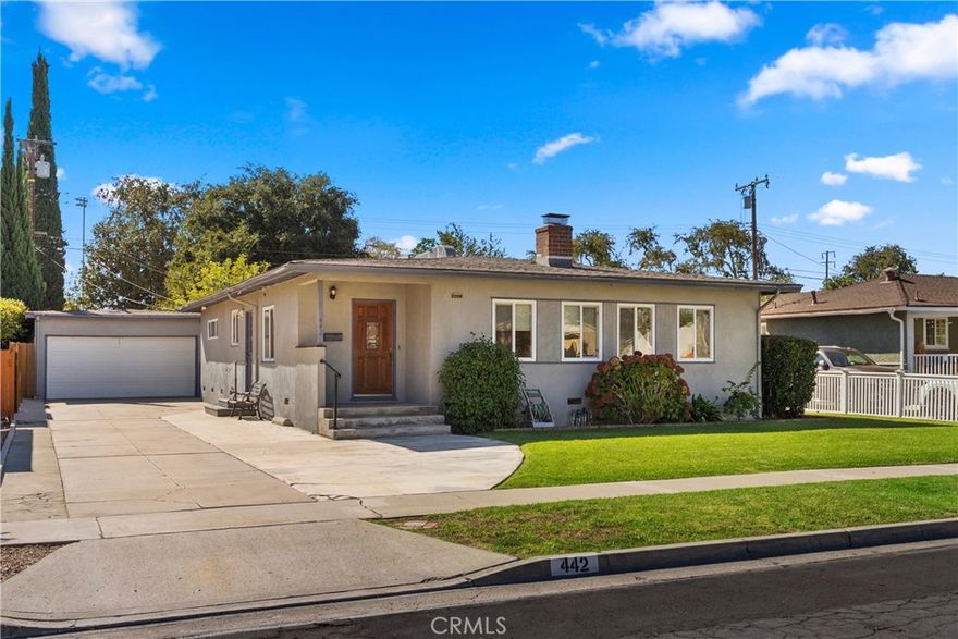 Welcome to 442 W Porter Avenue, a beautiful 3-bedroom, 2-bath home on an oversized lot!
Offering 1,517 square feet of comfortable living space in one of Fullerton’s most
established and desirable neighborhoods. From the moment you arrive, you’ll notice
the inviting curb appeal and the care that’s gone into every detail inside and out.
Step inside to a spacious, light-filled interior freshly painted in neutral tones and
featuring brand-new luxury vinyl plank flooring and plush carpet throughout. The
open living and dining areas create an ideal setting for both everyday living and
entertaining. The kitchen offers functionality and charm with plenty of counter
space, classic cabinetry, and the opportunity to make it your own, while the adjacent
indoor laundry room adds convenience and practicality.Each of the three bedrooms is comfortably sized, offering ample natural light and
closet space. The primary suite includes its own private bath, while the second
bathroom easily serves family and guests alike. Outside, enjoy a covered patio
attached to the garage — perfect for barbecues, outdoor dining, or simply relaxing in
the shade. The spacious yard provides plenty of room to garden, play, or personalize
to your lifestyle.With new paint, new flooring, and a thoughtful single-level layout, this
move-in-ready home blends modern comfort with timeless appeal. Ideally located
near top-rated schools, parks, shopping, and dining, 442 W Porter Avenue offers the
perfect balance of convenience, comfort, and California charm. The property also offers a sunroom attached to the garage that is not included in the square footage.