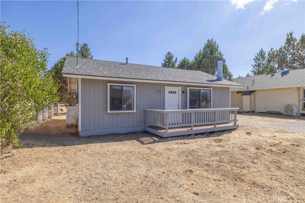 Tucked away on a quiet, paved street in Erwin Lake, this charming 2-bedroom, 1-bath home offers comfort, character, and endless potential. With great bones and a welcoming feel throughout, it's the kind of place that immediately feels like home—whether you're looking to settle in, create a cozy mountain getaway, or invest in a rental with long- or short-term appeal. Inside, the layout is efficient and inviting, with a natural warmth that encourages relaxation. Step outside and discover one of the home's most unique features—an open lot directly behind the property, giving you extra space, privacy, and room to dream. Perfectly positioned near all the outdoor adventures and charm that Big Bear has to offer, this property is a smart and versatile opportunity that won’t last long.