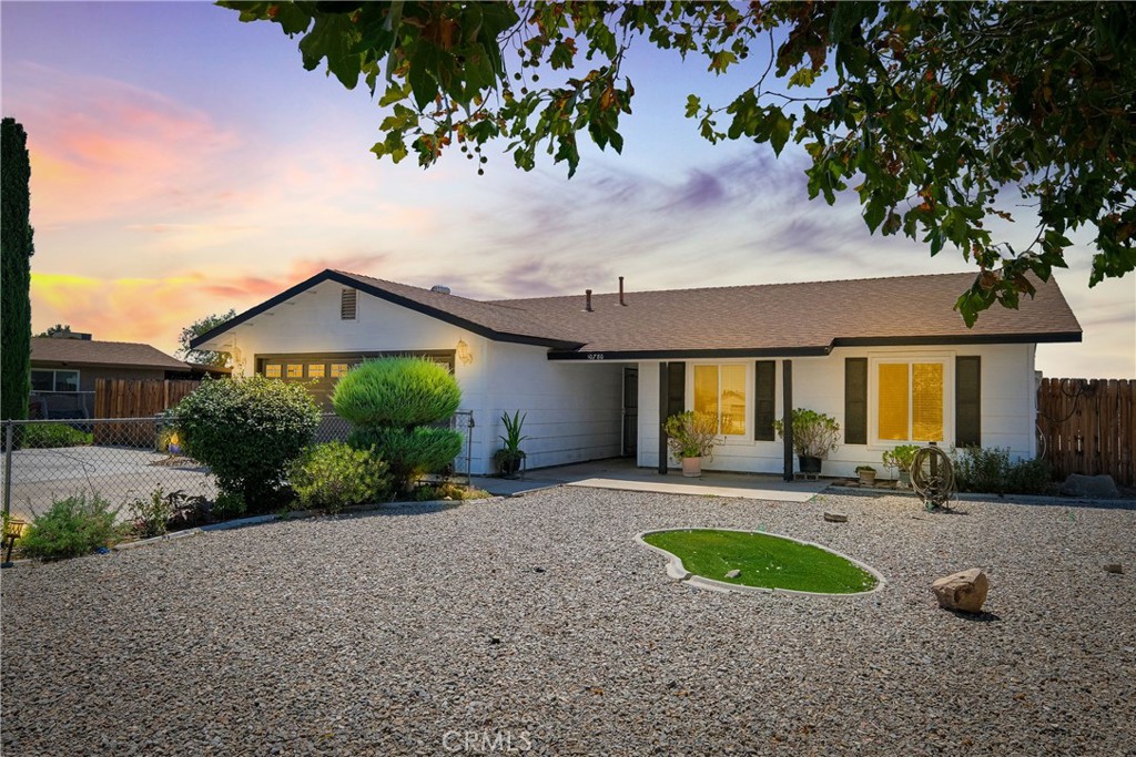 This charming 4 bedroom 2 bath home offers the perfect blend of comfort, style, and privacy. Fully fenced front to back and set on a quiet residential street lined with mature trees, it provides peace of mind and a welcoming atmosphere.
The open concept design includes a granite kitchen with stainless steel appliances, abundant cabinetry, and a center island that works well for casual dining or morning coffee. The fireplace area is cozy and connects easily with both the entry and the kitchen, making it ideal for a sitting area or formal dining space. An additional large room gives flexibility to serve as a family room, secondary living room, or even a home office or playroom. The primary suite is a retreat of its own with private backyard access that allows for quiet mornings or evenings on the patio.
The outdoor setting offers shade, greenery, and plenty of space to enjoy. A long covered patio creates a comfortable spot year round, while the backyard includes pear, apricot, plum, pomegranate, and grape vines along with nopales, lilac, mint, and jasmine. The property sits on a level lot with no sloping driveways and even front and back yards, giving you comfortable access and fully usable outdoor space. A wide cemented side yard provides room for RV parking or extra vehicles, and the opposite side features a separately fenced area that can serve as a dog kennel or additional private space.
This home blends comfort, practicality, and outdoor charm, making it ready for you to move in and enjoy.