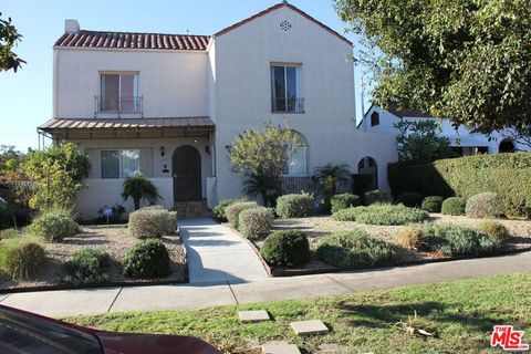 Photo of 1239 S Hudson Avenue, Los Angeles, CA 90019 (MLS # 26657399)