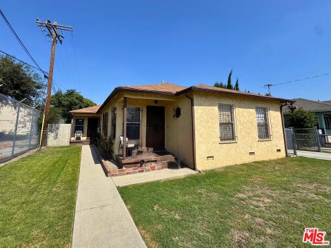 Photo of 315 E Elm Street, Compton, CA 90221 (MLS # 26996265)