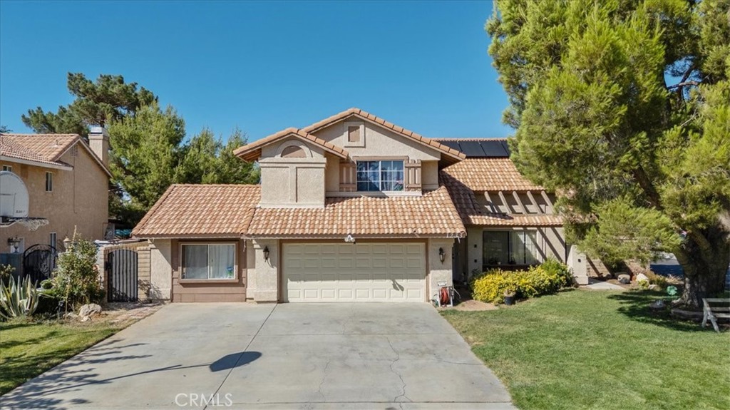 Welcome to your new home in the City of Palmdale! This 4-bedroom, 3-bathroom home offers a perfect blend of comfort and convenience. The welcoming first floor boasts a large living room with high ceilings, a family room with a cozy fireplace, a bright kitchen, a dining space, a separate washer/dryer area, and a full bathroom. Upstairs, you’ll find all bedrooms, including the primary suite, for added privacy. This home also offers a big front yard, a generous size driveway with parking for up to nine vehicles, a backyard deck, a pool, a jacuzzi, two storage units for extra storage, and side entrances on both sides for easy access. For added comfort and savings, the home is equipped with central AC plus solar panels to help with your electricity bill. With these fantastic features, this home is sure to impress. Must see to appreciate! Schedule your showing today!
