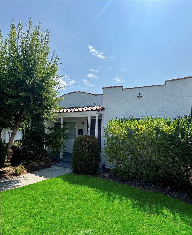 Remodeled 2 Bedroom / 1 Bathroom stand-alone home located in front of a small apartment complex, featuring hardwood floors throughout, a custom kitchen with peninsula seating, waterfall quartz countertops, and stainless steel appliances including refrigerator, dishwasher, range/oven, and microwave hood. The home offers tiled bathroom flooring with a custom shower wall, high-end light fixtures, recessed lighting, central air & heat, and in-unit washer and dryer. Two parking spaces are included. Conveniently situated near the 5 and 134 Freeways, this beautiful home borders Glendale and Burbank, providing easy access to shopping, dining, and entertainment.