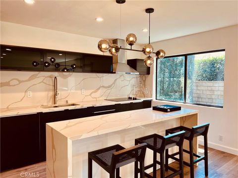 Photo of 7046 De Celis #5, Van Nuys, CA 91406 (MLS # SR26011920)