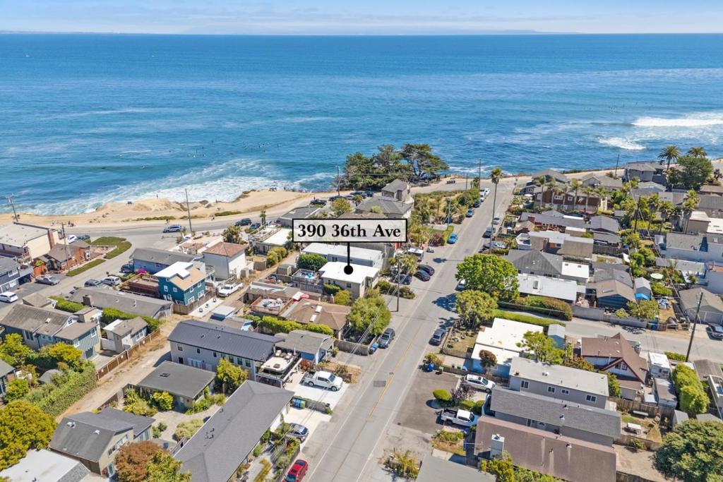 Rare Pleasure Point triplex just steps from the stairs at Jack's, one of the most iconic surf spots on the Point. This well-positioned property offers the ultimate blend of coastal lifestyle and investment potential. The upper unit is a bright and airy one bedroom with a large private deck and ocean views, while the ground level features a charming studio and a separate two bedroom unit, each with generous outdoor space, private storage, and easy rear alley access to the Esplanade. All units include full bathrooms, in-unit laundry, and off-street parking. Recent roof replacements add peace of mind. Located in the heart of the World Surfing Reserve, you're surrounded by top-tier waves, local cafés, boutique shops, and everything that makes Pleasure Point one of the most beloved beach communities on the California coast. Live here full time, rent part time, or use as a 1031 exchangetheres flexibility for every kind of buyer.
