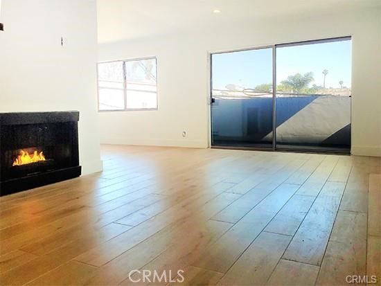 Modern apartment located in a prime area of Santa Monica, just blocks from the ocean. The building is a quiet & secured 3-story over subterranean parking, which includes 1 parking space. Unit is on bottom floor, has hardwood floors, new appliances, with washer and dryer in unit. The building has a small gym and sauna. Located in prized Santa Monica Malibu School District.