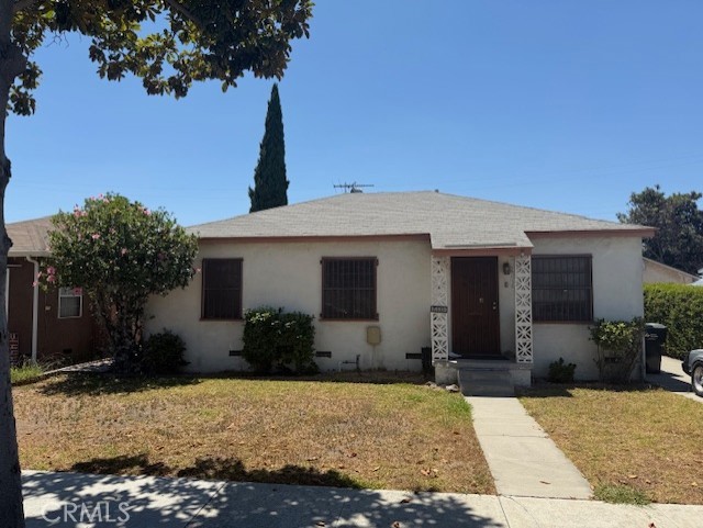 Property in need of major updating. Ideal for investor or buyer looking for a project. Room off garage can potentially be used as ADU.