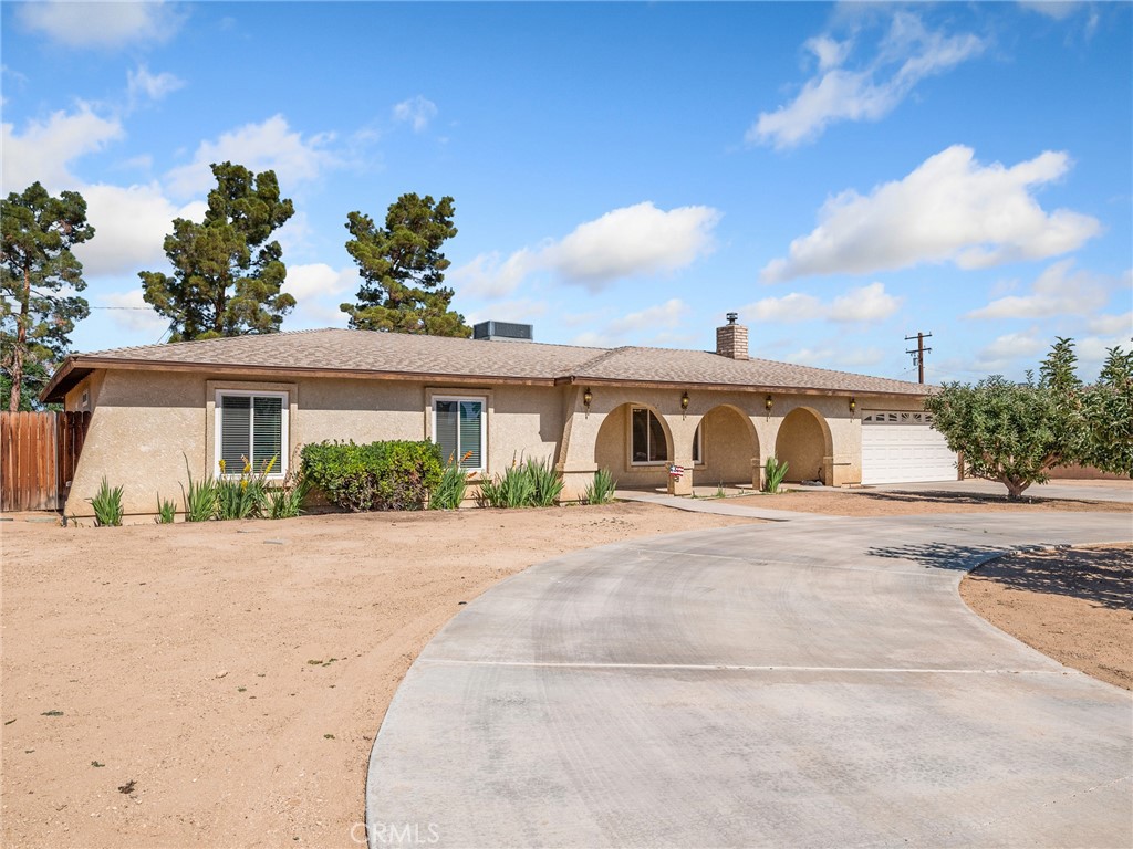 WELCOME HOME! This spacious 4bd 3bath home is located in the highly sought after Desert Knolls neighborhood of Apple Valley! Perfectly situated on a quiet street, this charming home offers endless possibilities for comfortable living and entertaining. As you step inside to an open floor plan filled with natural light you'll notice the heart of the home is a large living room with a cozy wood burning stove, lovely kitchen with breakfast bar, formal dining area for those special gatherings, and a comfortable family room with French doors that give you direct access to the back patio!
The large master suite has a walk-in closet (plus an additional bonus closet) along with French that lead out to the peaceful back yard. Three additional good sized bedrooms provide versatility for family, guests and/or a home office. Additional highlights include a two-car garage, RV parking, newer dual paned energy efficient windows throughout, newer 16 seer heating/air system, and newer roof replaced 2016. Spacious back yard includes a gazebo, storage shed and large garden boxes. Don't miss the opportunity to own this beautiful home in a prime location !!