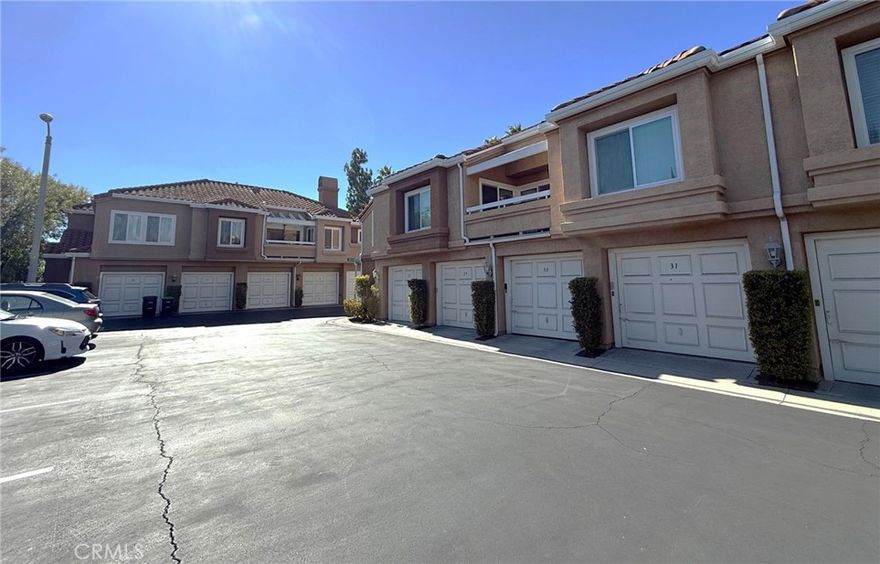 Beautiful Lake Shores Gated Community. Steps away from Lake. Laminated wood floor through out. 1,308 square feet of living spaces featuring 2 bedrooms and 2 full newly remodeled bathrooms. Rent include washer, dryer, dish washer, and refrigerator. Upper level End unit with large wrap around Balcony. Spacious living room with Fireplace, dinning area, open kitchen with breakfast nook. Large Master suite with Master bath, separate shower and dual sinks.  Individual LAUNDRY ROOM with nice washer and dryer.  2 separate one (1) car garage, one garage space just down the stairs of the unit. HOA includes water, trash,  MEMBER OF LAKE FOREST BEACH AND TENNIS CLUB. The Beach & Tennis Club offers a Jr. Olympic swimming pool, a smaller north pool, beach and swim lagoon, five tennis courts, one Pickleball court, two half court basketball courts, a sand volleyball court, fitness center, Lake View Lounge, two pool tables and shuffleboard.  Easy access to Freeways 5 and 405,  Irvine Spectrum, shopping centers , Albertson Supermarket and restaurants.