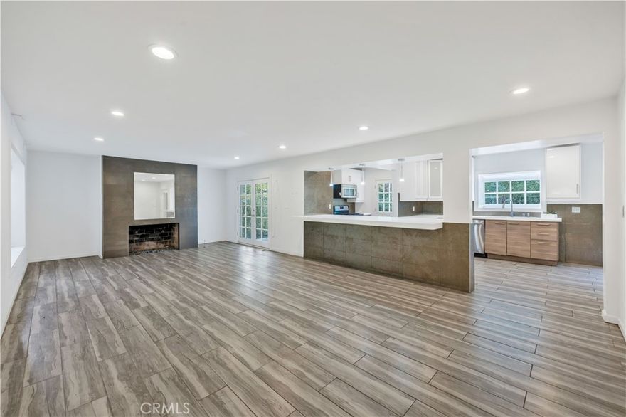 Nestled in the highly coveted Beverly Hills Post Office neighborhood, 1643 San Ysidro Drive offers a rare blend of privacy, space, and timeless California living. Set against a lush hillside backdrop, this inviting residence delivers incredible scale, natural light, and a floor plan that is both functional and full of potential.

The home features five generous, full-sized bedrooms—an exceptional offering for the area—along with an additional bonus room perfect for a home office, gym, studio, or guest space. With five bathrooms total, the home easily accommodates both everyday living and extended-stay guests.

Inside, you’re welcomed by expansive living areas accented by large windows, French doors, and an inviting fireplaces. The kitchen opens to the main living space and offers ample cabinetry, updated counters, and room to customize if desired. Several upgrades have been completed over the years, providing a solid foundation for comfortable, immediate living, while still giving buyers the flexibility to personalize and elevate the home over time.

The spacious primary suite enjoys direct access to the outdoors and features a sitting area, interior fireplace, and oversized closet space. Secondary bedrooms are equally impressive—bright, roomy, and thoughtfully positioned throughout the home for privacy.

The property sits just minutes from the heart of Beverly Hills, world-class dining, exclusive boutiques, and prestigious private schools—while still offering the feeling of your own quiet retreat tucked into the hills. Outdoor areas enjoy gjavascript:__doPostBack('m_lbSubmit','')reenery, hillside views, and the potential to be transformed into serene lounge or garden spaces.

Move in comfortably on day one, or enhance the home at your own pace—an ideal opportunity in one of Los Angeles’ most desirable and iconic neighborhoods