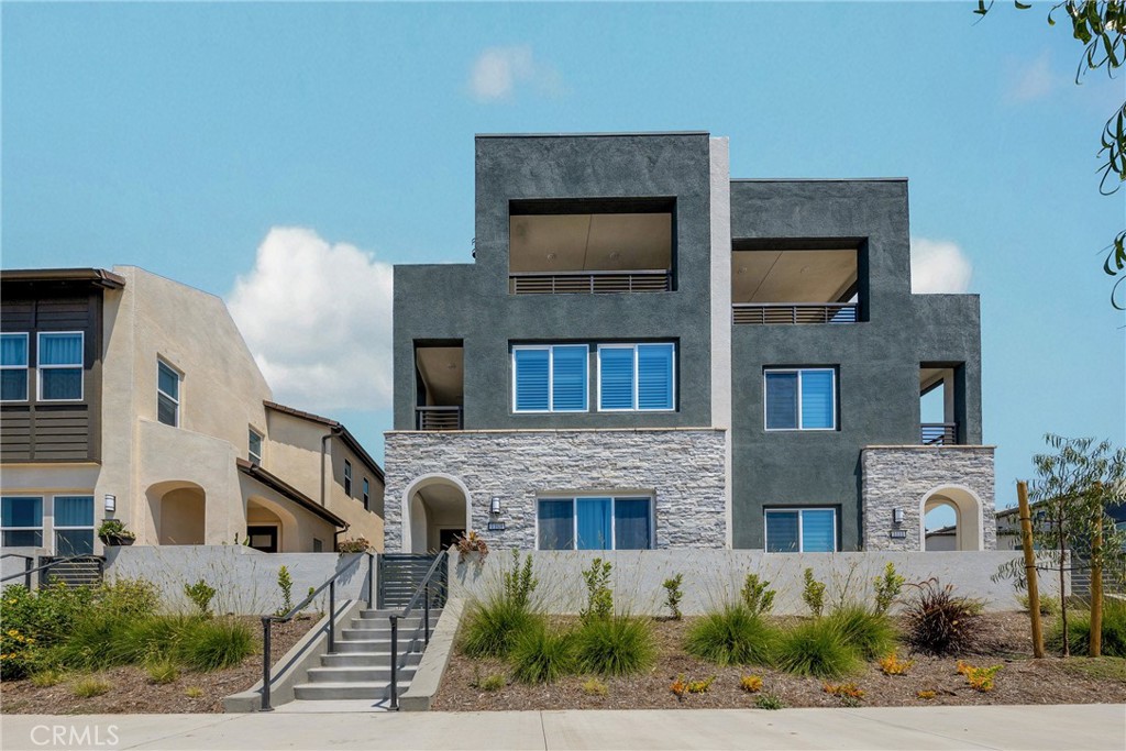 Modern & Chic Townhome in the Coveted Great Park Neighborhood!
Experience contemporary living in this bright and sunny townhome located in the heart of the renowned Great Park community. This beautifully appointed residence features an open and airy floor plan with abundant natural light throughout. The exclusive primary suite boasts its own private balcony, perfect for morning coffee or evening relaxation. An additional oversized suite offers a spacious covered balcony with sweeping open views—ideal for entertaining or quiet retreat.
Enjoy access to top-rated schools, including the award-winning Portola High School. Conveniently situated near Irvine Spectrum Center, major business complexes, world-class hospitals, UC Irvine, and minutes from major freeways and scenic coastal beaches—this home truly offers the best of SoCal living. Solar panels leased, tenant to pay the solar panel lease $102 per month.