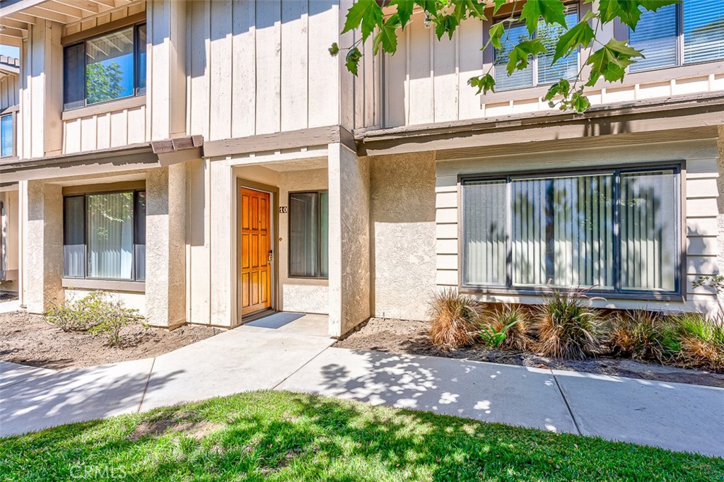 A roomy two-story townhome that is move-in ready.
The first floor has a large living room with a gas log fireplace for a warm cozy setting. The first floor has been upgraded with engineered wood flooring. The kitchen includes upgrades such as Viking stove and dishwasher, the kitchen cabinets have been freshly refinished. An adjoining dining area opens onto a secluded finished patio perfect for BBQ or outdoor relaxing. A third bedroom and half-bath complete the first floor. Two primary bedroom suites, each with large walk-in closets, occupy the second floor. Include two upgraded bathrooms.
A gated shared driveway leads to a detached finished 2-car garage complete with cabinets on both sides and laundry hook-ups. This is a family-like community consisting of just 11 units; the HOA provides all water, trash service and security monitoring system.
Conveniently located within 0.4 - 0.75mi walking distance of nearby elementary, middle school, High School, shopping mall, bank and restaurants.