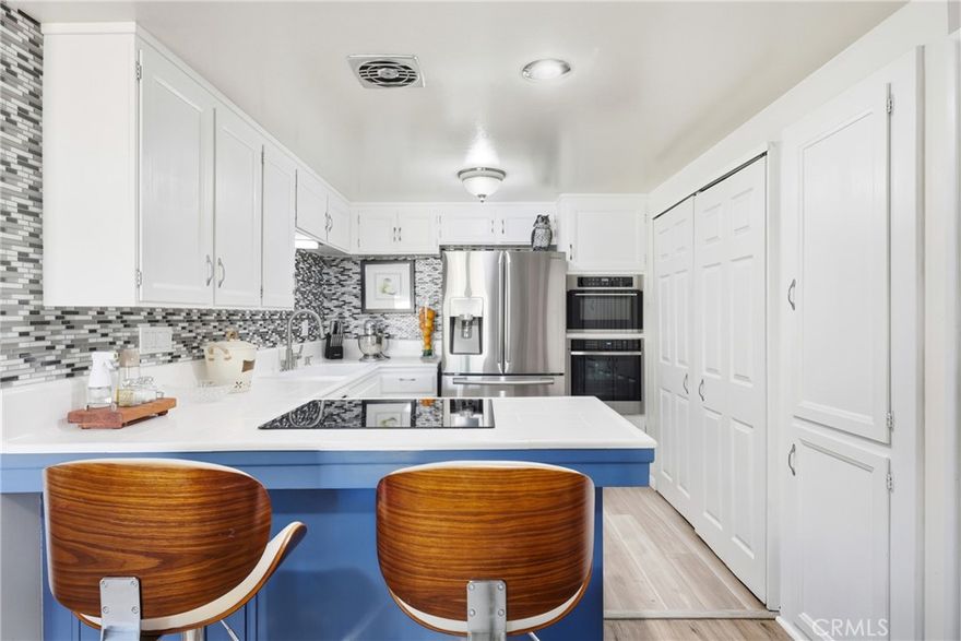 Welcome to this beautifully remodeled three-bedroom, two-bathroom home nestled on a peaceful cul-de-sac in Gardena. From the moment you arrive, the manicured front yard and private entryway set the tone for the comfort and care that define this property. Inside, enjoy a bright living room with a cozy fireplace, a formal dining room or a flexible family space, and a modern kitchen featuring a double oven, microwave, refrigerator, and pantry, with a washer and dryer conveniently located nearby. Each bedroom is generously sized and tastefully updated, while the main suite offers a private retreat with a well-designed layout. Step into the backyard oasis, perfect for entertaining or relaxing, complete with a built-in BBQ, refrigerator, freezer, pool table, and lawn area — ideal for family gatherings or quiet evenings under the stars. With central air conditioning, a spacious two-car garage, and easy access to major freeways, this home blends modern comfort with everyday practicality. It’s an excellent opportunity for those looking to settle into a community that feels both welcoming and connected. This isn’t just a home — it’s a place to create lasting memories and enjoy California living at its best.