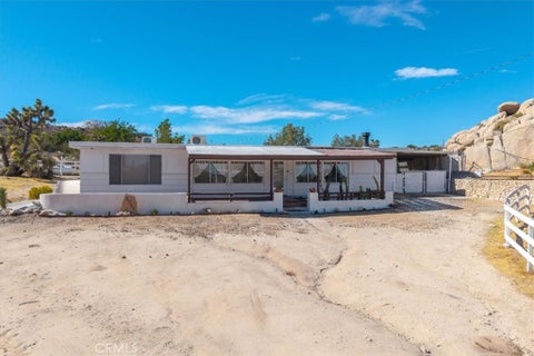 Photo of 5660 Rowell Road, Yucca Valley, CA 92284 (MLS # JT26224628)