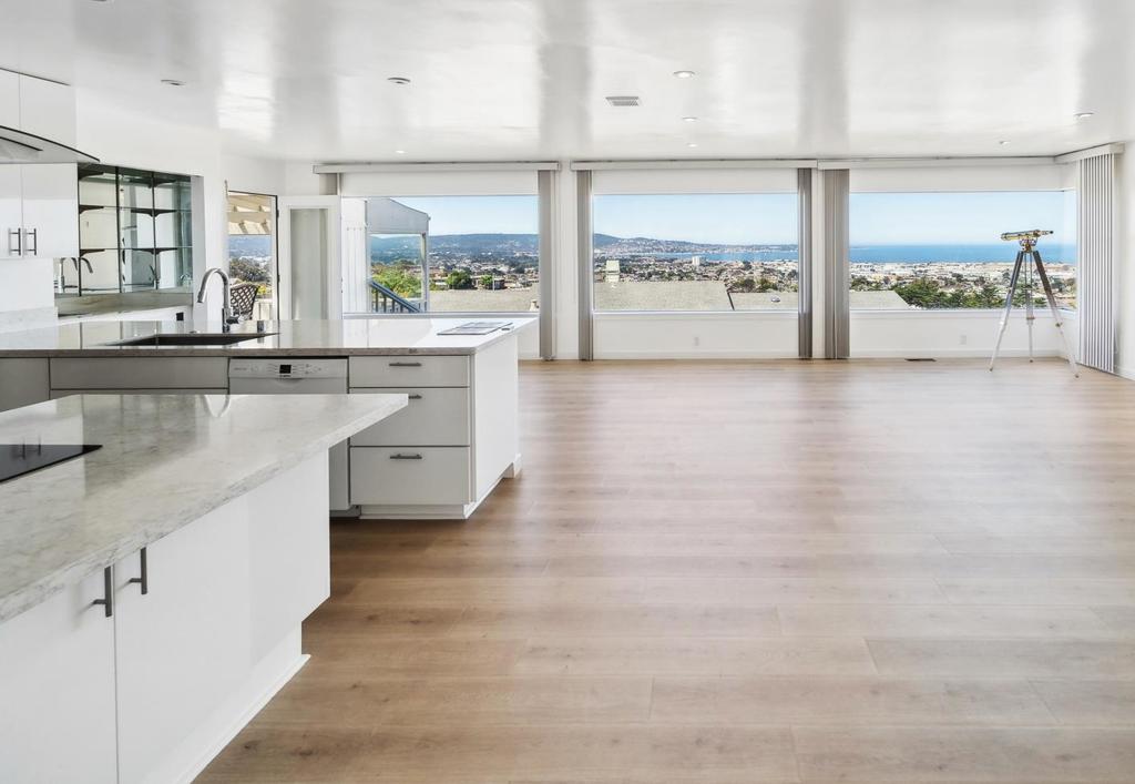 One of the most breathtaking ocean views of the entire Monterey Bay. Located on exclusive Skyview Drive, Newly remodeled home with a modern kitchen with additional cooking islands opens onto the spacious living and dining room areas. Also has a mini-bar counter and sink, and an open office/family area next to the kitchen, all new appliances less than 3 years old. Engineered floor throughout the kitchen and living areas, and with new carpet in all of the bedrooms. There are 2 master bedrooms which have their own full bathrooms. 3rd bedroom has its own perfect view of the bay. Each bedroom has its own deck area and are freshly painted. Dramatic semi-enclosed sun-room deck has patio furniture and a picnic table which overlooks the entire bay as well. 2 car attached garage with washer and dryer, and plenty of storage. Home located in the exclusive area of Mescal Heights, nestled on a cul-de-sac in a peaceful and safe neighborhood. Conveniently located to General Jim Moore Road, Highway 68, and Broadway Ave. Great hiking and biking in the Fort Ord Recreational Parks area right behind the home. You must see this very unique property for yourself!