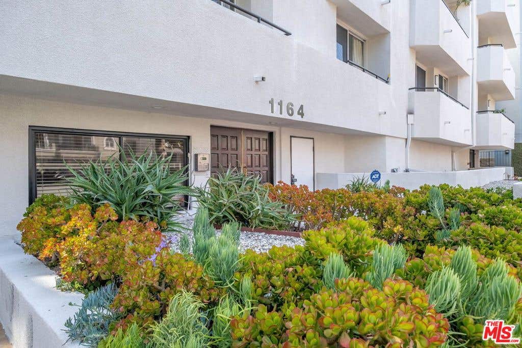 Photo of 1164 Wellesley Avenue #204, Los Angeles, CA 90049 (MLS # 26832005)