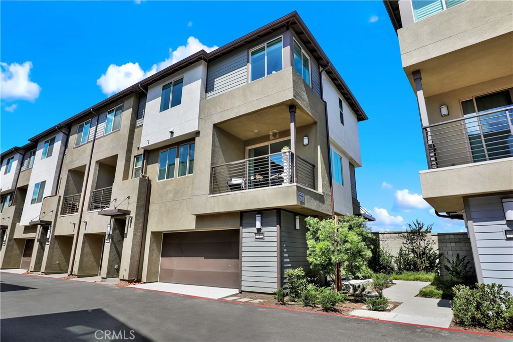 Step into modern sophistication at this newly built 2023 end-unit townhome in the exclusive Hudson gated community of Placentia. With 3 spacious bedrooms, 2.5 bathrooms, and over 1,360 square feet of thoughtfully designed living space,
The open-concept layout showcases warm wood flooring, high-end finishes, and $35,000 in upgrades over the base builder model. A wired smart home, so you can control every light switch, tv, appliance, door lock or change in temperature from the comfort of your bed or while away from the home. Additionally energy efficiency is focal point with paid-off solar, a tankless water heater, and smart-home features designed for comfort and cost savings. An oversized two-car garage provides ample storage, while the corner-lot south east facing location ensures abundant natural morning light. The gourmet kitchen and expansive living areas are ideal for both entertaining and quiet nights in. Upstairs, the primary suite offers a bath and a generous walk-in closet, delivering a private retreat you’ll look forward to at the end of every day.
The Hudson community is designed with lifestyle in mind, featuring beautifully landscaped grounds and upcoming amenities including a recreation area, playground, basketball court, and dog park. With low HOA fees and a prime location near top schools, shopping, and dining, this property offers both value and distinction.