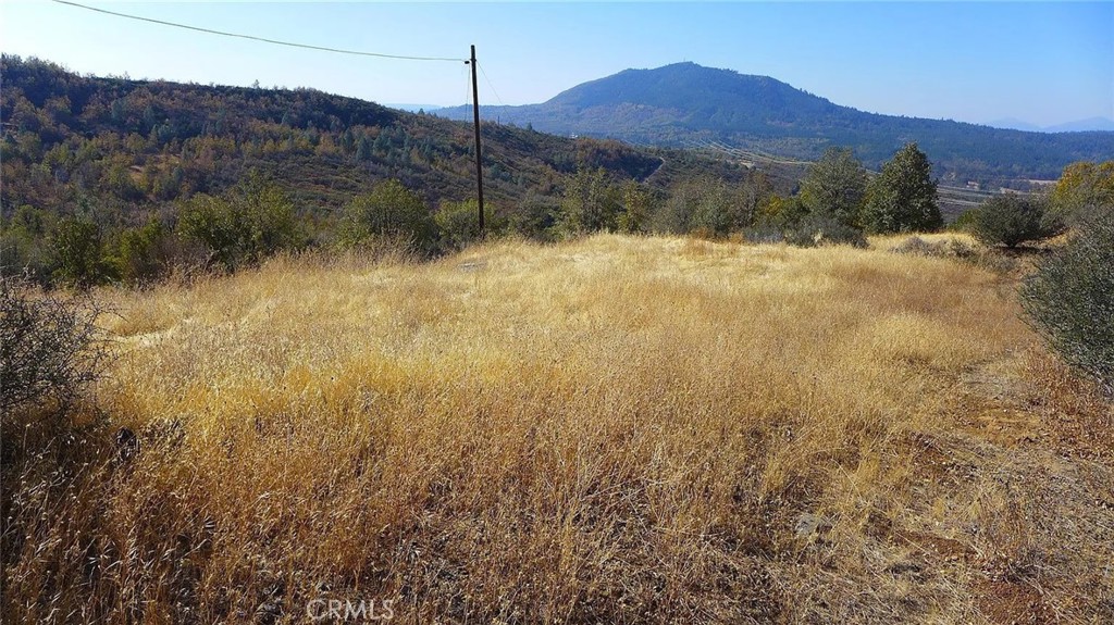 Looking for privacy, seclusion, and stunning mountain views? This off-grid parcel in Round Mountain is the perfect spot to bring your vision to life. Whether you dream of building a full-time residence, a vacation retreat, or a weekend camping getaway, this property offers endless possibilities. Located at the end of Crestline Drive, the land provides peace, quiet, and spectacular scenery. AWD/4x4 access is recommended, but once you arrive you’ll feel like you’re in your own private sanctuary. With power available nearby and plenty of open space for solar, you’ll have flexible options for energy. A well and septic will need to be installed, giving you full control over your off-grid setup. Opportunities like this are rare, land with views like these don’t come along often. Come experience the serenity and imagine the home or retreat you could create.