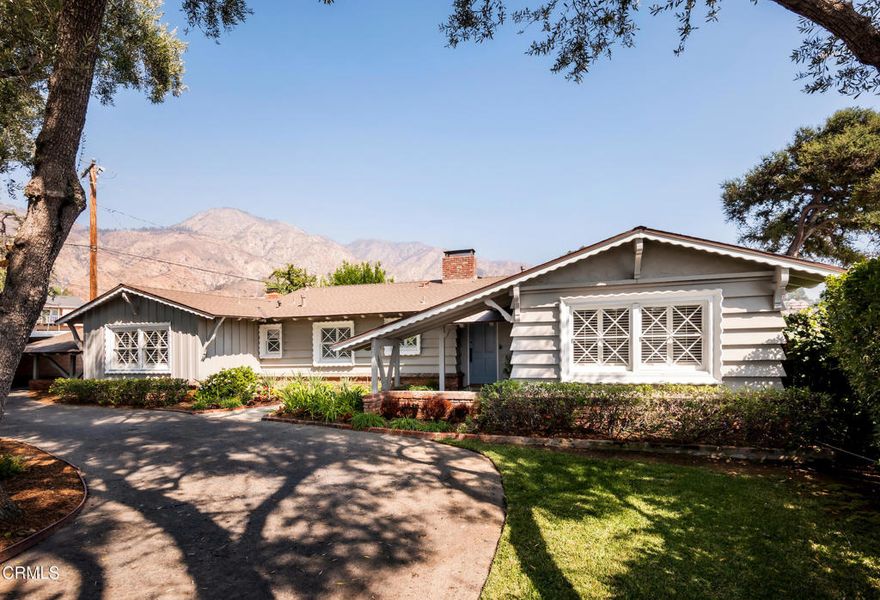 Character and timeless charm come together beautifully in this inviting 1955 Northeast Pasadena residence. Featuring 3 bedrooms, 2 bathrooms, a den, and 2,359 square feet, this home exudes warmth, comfort, and pride of ownership throughout.  The moment you step inside, you'll notice the meticulous care and attention this home has received over the years. The spacious living and dining areas feature striking beamed ceilings, a cozy fireplace, gleaming hardwood floors, and picture windows framing views of the lush backyard. The renovated kitchen blends classic style with modern convenience, showcasing sleek contemporary finishes and a cheerful breakfast nook--perfect for enjoying your morning coffee.Designed with entertaining in mind, the floor plan flows effortlessly into a generous den, complete with its own fireplace--ideal for cozy evenings, movie nights, or game-day gatherings. The primary suite offers a serene retreat with its charming dressing area, walk-in closet, and a luxuriously updated bathroom. The second bathroom has also been thoughtfully renovated, featuring elegant finishes and modern fixtures that complement the home's classic character.A light-filled sunroom just off the living area provides a flexible space for relaxing, entertaining, or working from home. Step outside to your private backyard oasis, where mature landscaping and peaceful surroundings create the perfect backdrop for outdoor living. Nestled in the scenic foothills, just minutes from Pasadena's vibrant shops, dining, and cultural attractions, this home offers the perfect blend of tranquility and​​‌​​​​‌​​‌‌​​‌​​​‌‌​​​‌​​‌‌​​​‌​‌​​​‌‌​ convenience.